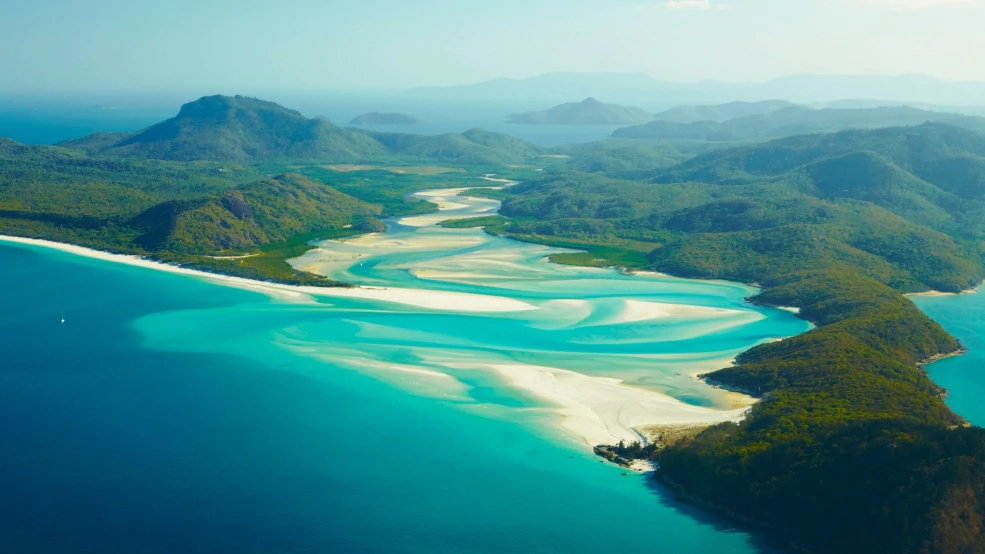 This Australian beach is famous for its turquoise colored waters and crystal white silica sands.