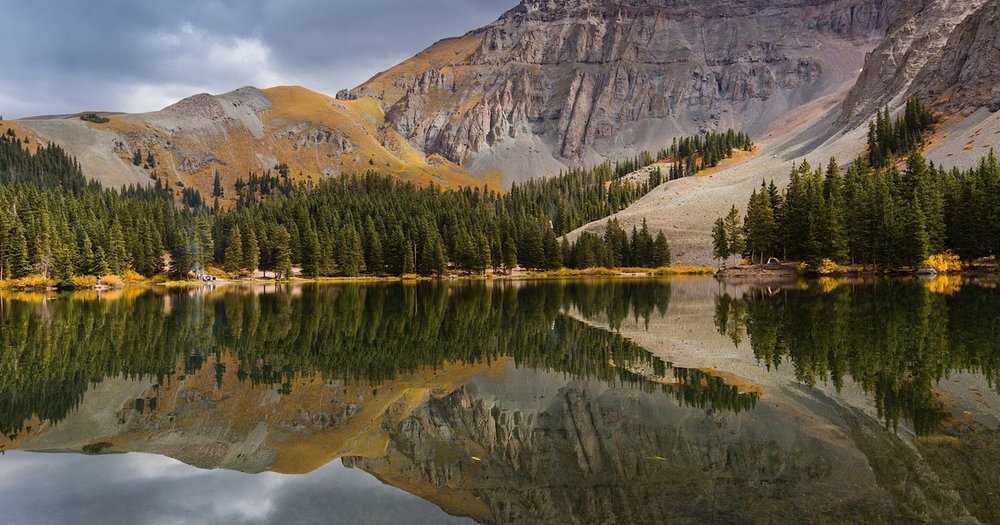Conquer the world by hiking in the towering mountains of Alta Lakes.