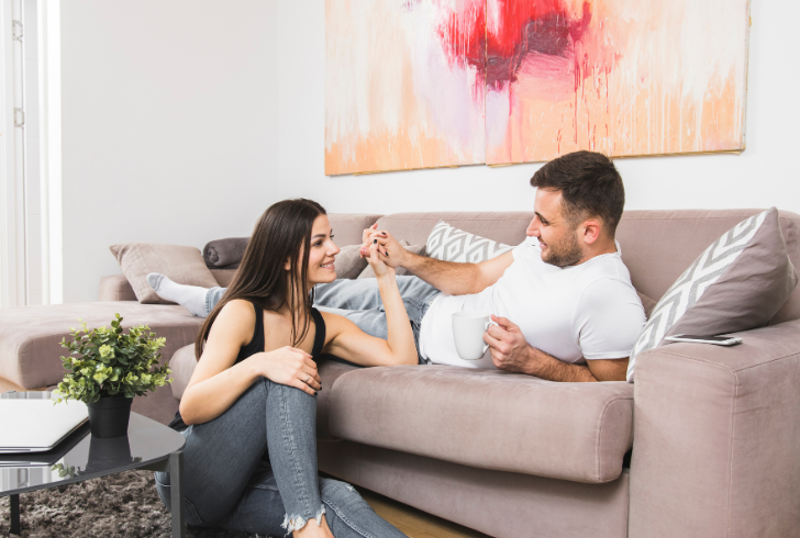 Couple sharing emotional conversation at home
