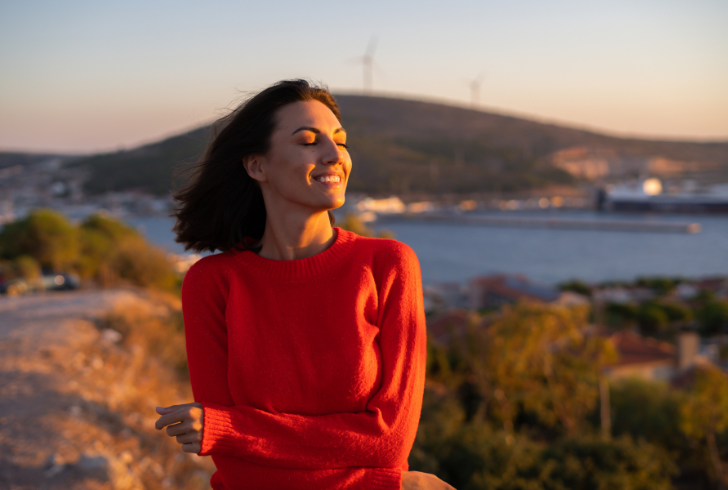 Person reflecting calmly despite simple surroundings